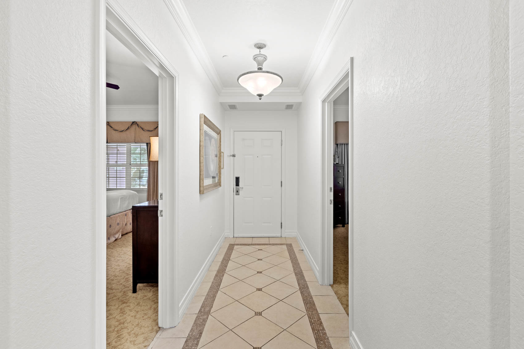 inside front door with white hallway